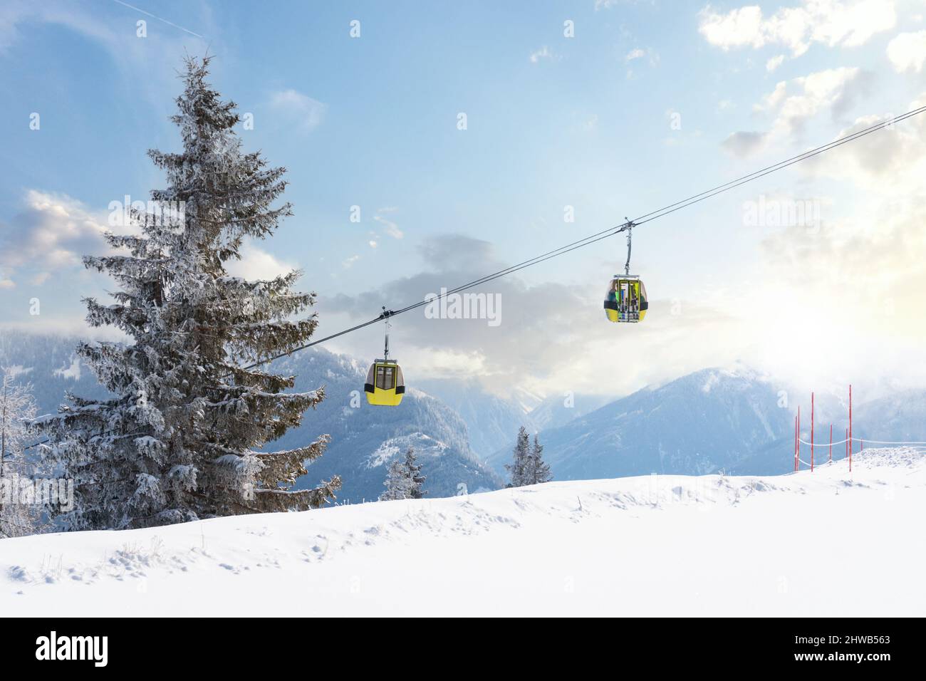 Cable car in a skiing resort in Europe during winter holiday vacation. Stock Photo