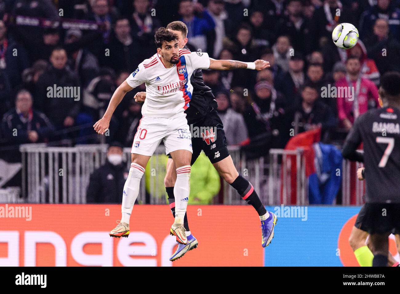 LYON, FRANCE - FEBRUARY 27: Lucas Paquetá of Lyon (L) heads the ball during  the Ligue 1 Uber Eats match between Olympique Lyonnais and Lille OSC at  Groupama Stadium on February 27,