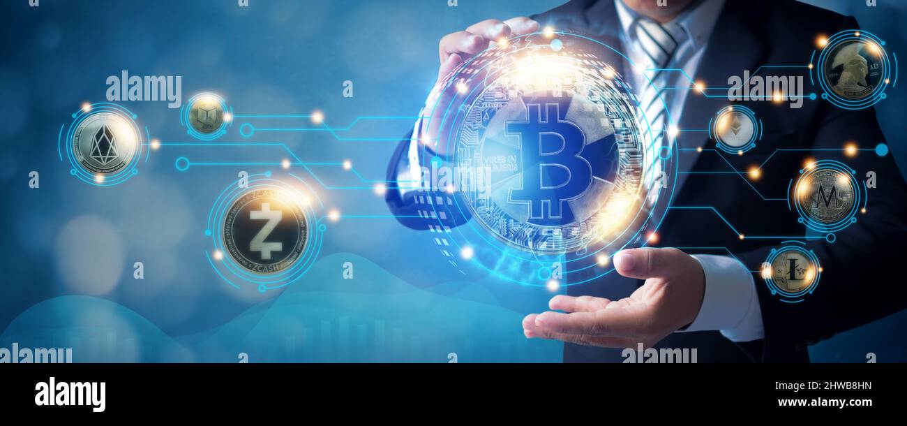 Digital bitcoin and crypto currency network, Blockchain and NFT technology  trade and exchange financial innovation futuristic, Businessman holding coi  Stock Photo - Alamy