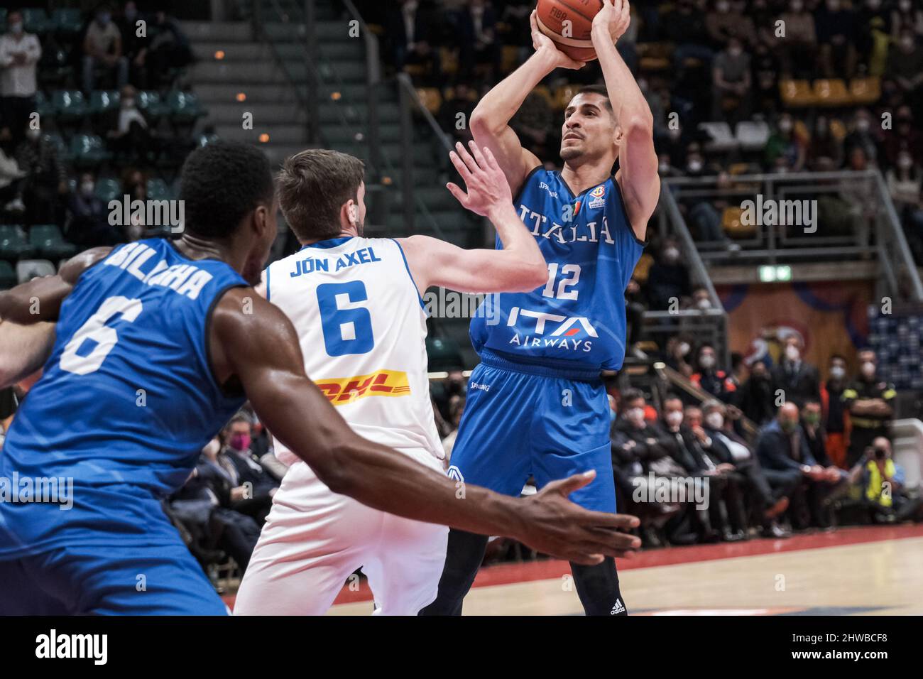 Bologna, Italy. 27th Feb, 2022. Diego Flaccadori (Italy) and Jon Axel Gudmundsson (Iceland) in action at the qualify for the FIBA Basketball World Cup 2023.Italy wins against Iceland with a score of 95 to 87. (Credit Image: © Elena Vizzoca/Pacific Press via ZUMA Press Wire) Stock Photo