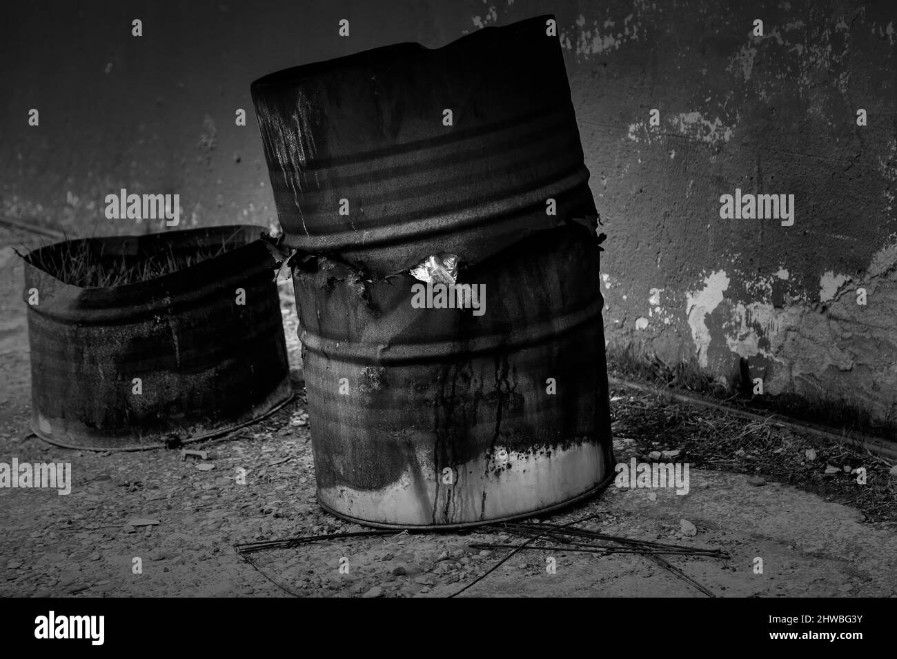 Industrial rusty metal barrel, environmental pollution, corrosion Stock