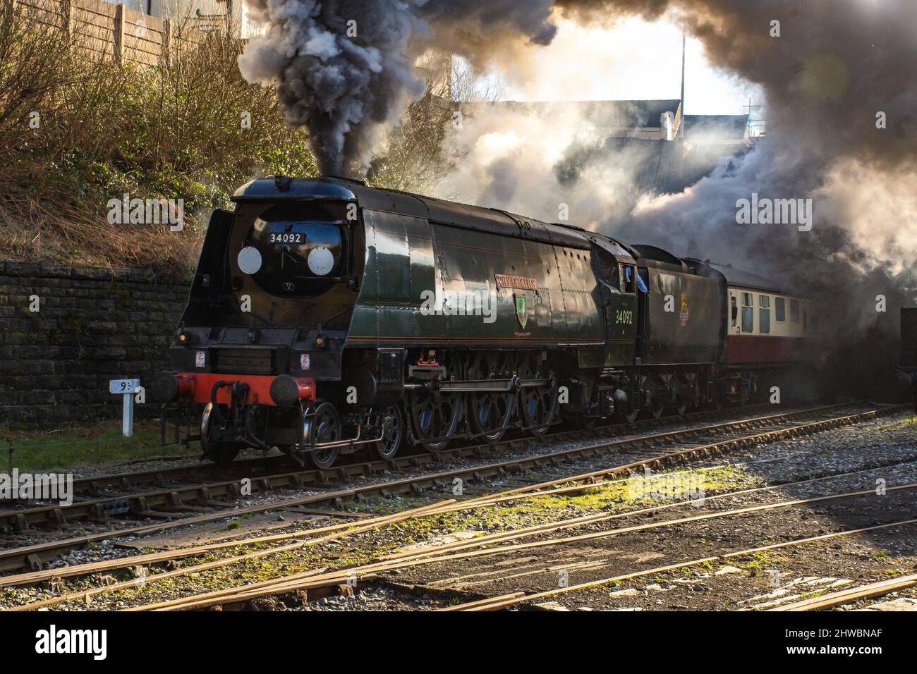 Bullied 7P5FA 4-6-2 ‘West Country’ class locomotive number 34092 The City of Wells leaving Bury station on the East Lancs Railway Stock Photo