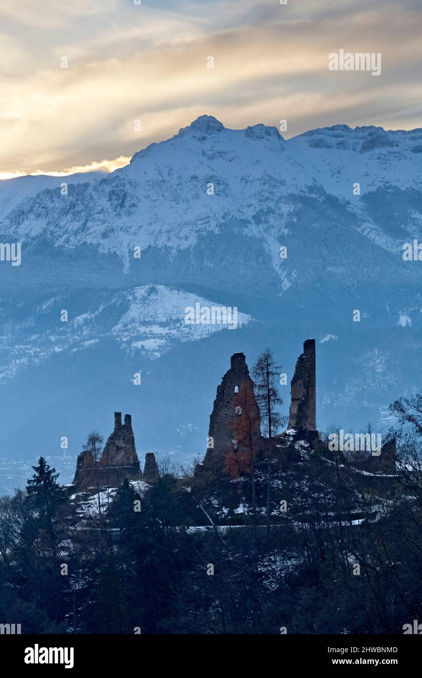 The medieval ruins of Selva Castle and mount Vigolana in winter. Levico Terme, Trento province, Trentino Alto-Adige, Italy, Europe. Stock Photo
