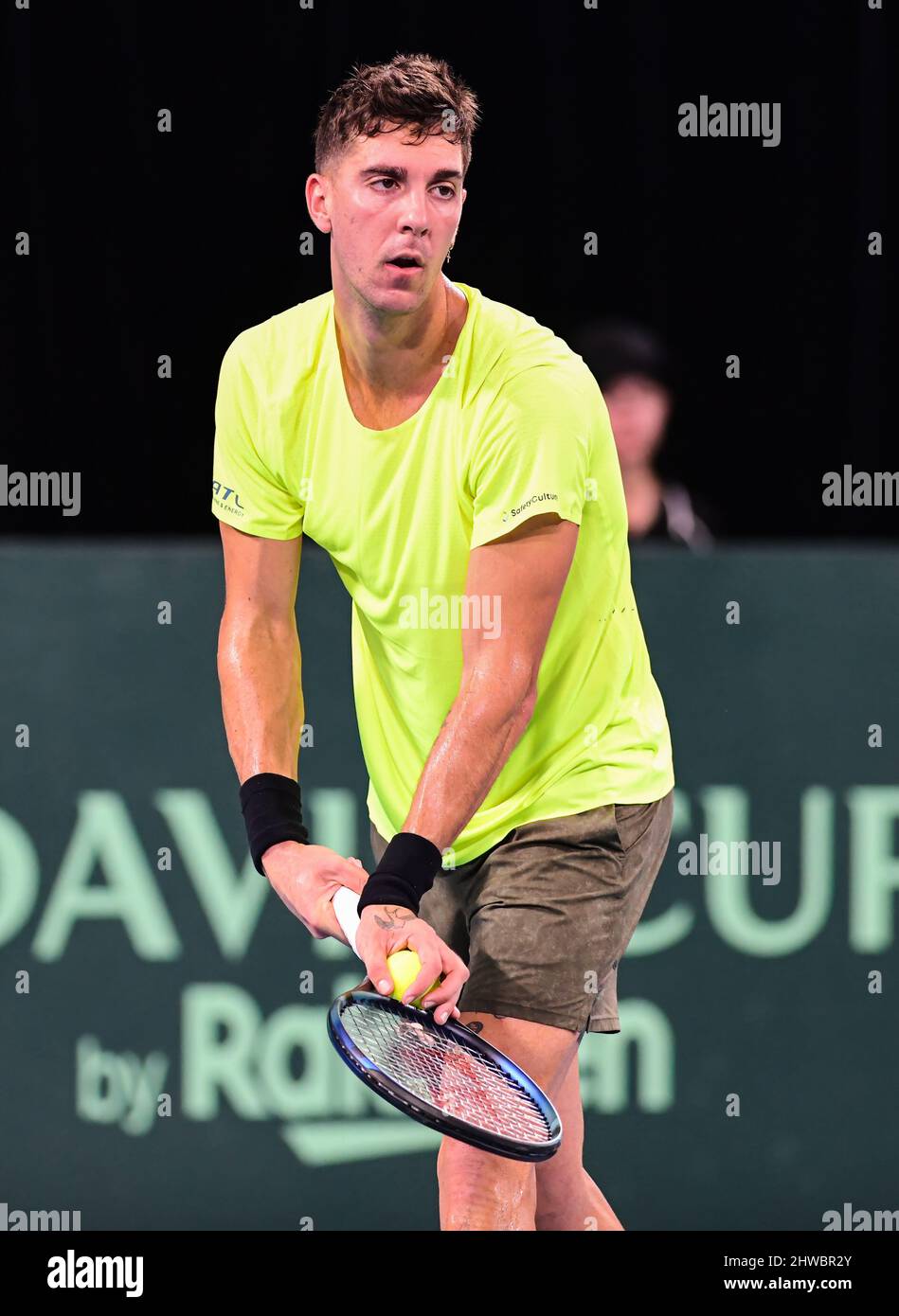 Thanasi Kokkinakis of Australia in action during the 2022 Davis Cup Qualifying Round match against Zsombor Piros of Hungary at Ken Rosewell Stadium