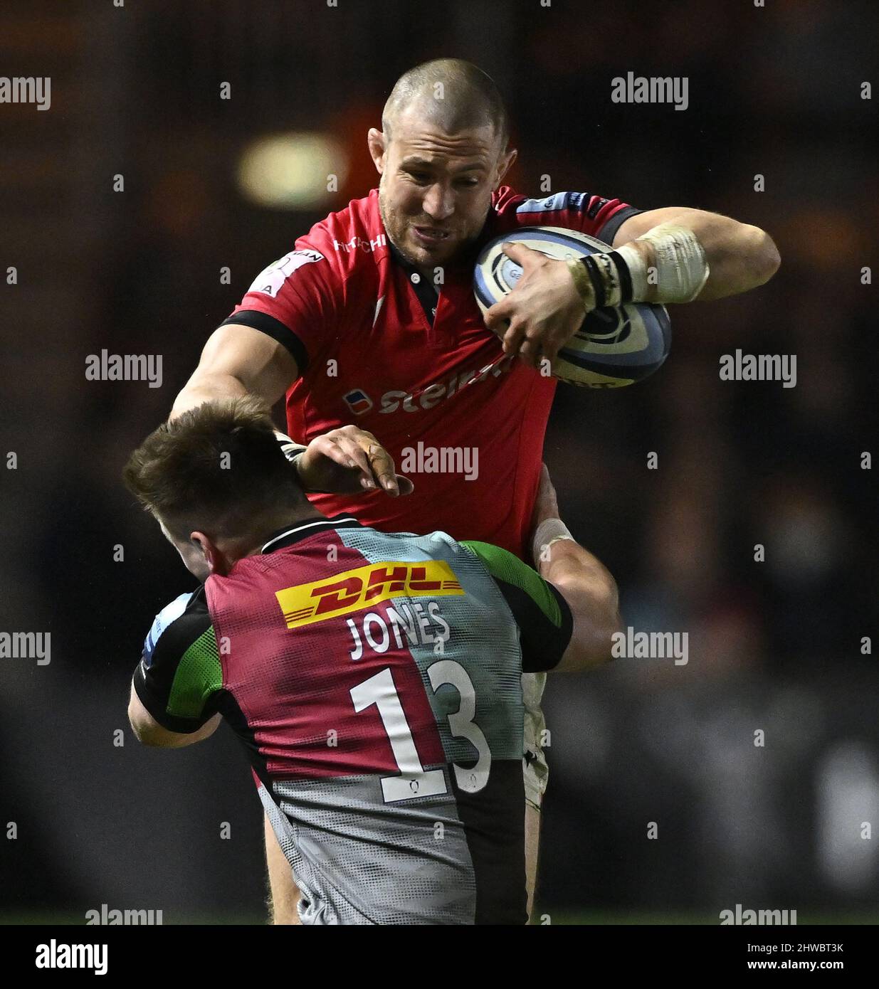 Twickenham, UK. 04th Mar, 2022. Premiership Rugby. Harlequins V Newcastle Falcons. The Stoop. Twickenham. Mike Brown (Newcastle Falcons) is tackled by Huw Jones (Harlequins) during the Harlequins V Newcastle Falcons Gallagher Premiership rugby match. Credit: Sport In Pictures/Alamy Live News Stock Photo