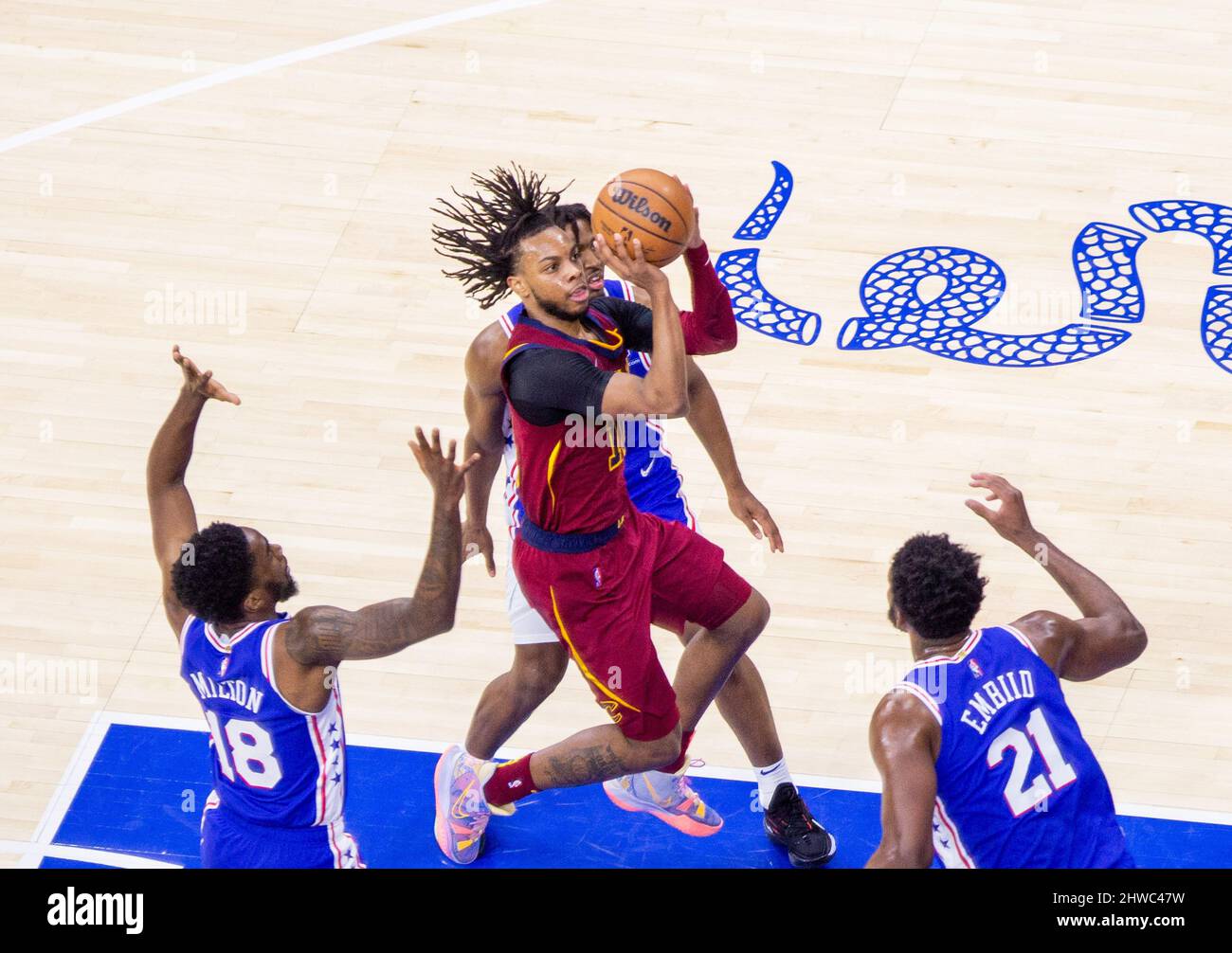 Tyrese Maxey (76ers 0)
and Tobias Harris (76ers 12)
trying to block  Jarrett Allen (Cavaliers 31) shot during the National Basketball  Association game between the Philadelphia 76ers and Cleveland Cavaliers at  Wells Fargo Center