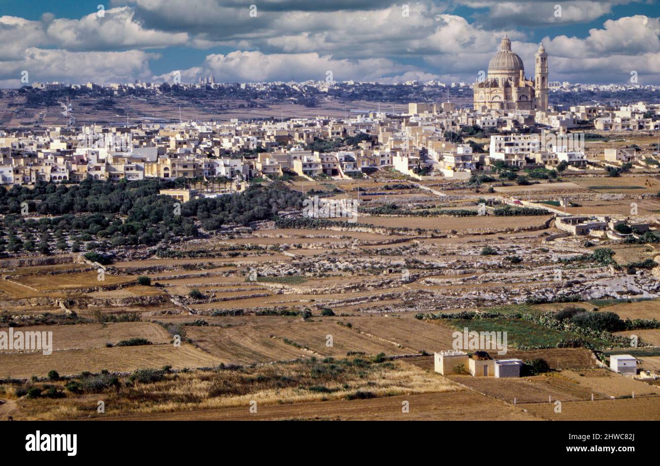Gozo, Malta.  Farmland, town of Xewkija in middle distance. Stock Photo