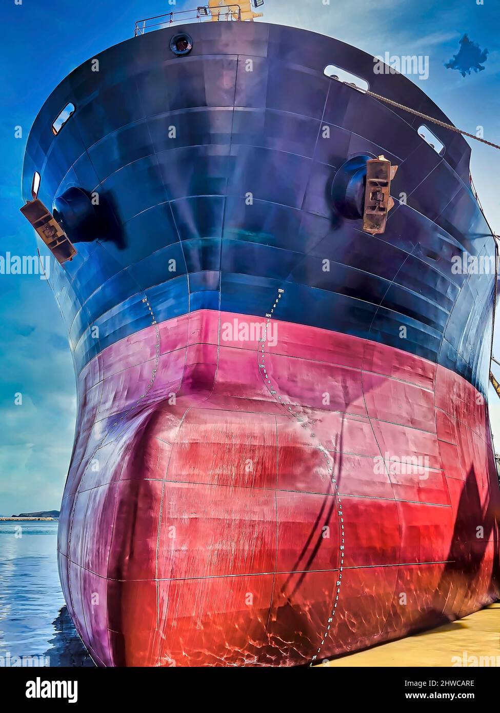 Bulk Carriers Bow. Isolated. Seventy thousand ton bulk carriers bow in docked in a Greek shipyard. Stock Image . Stock Photo