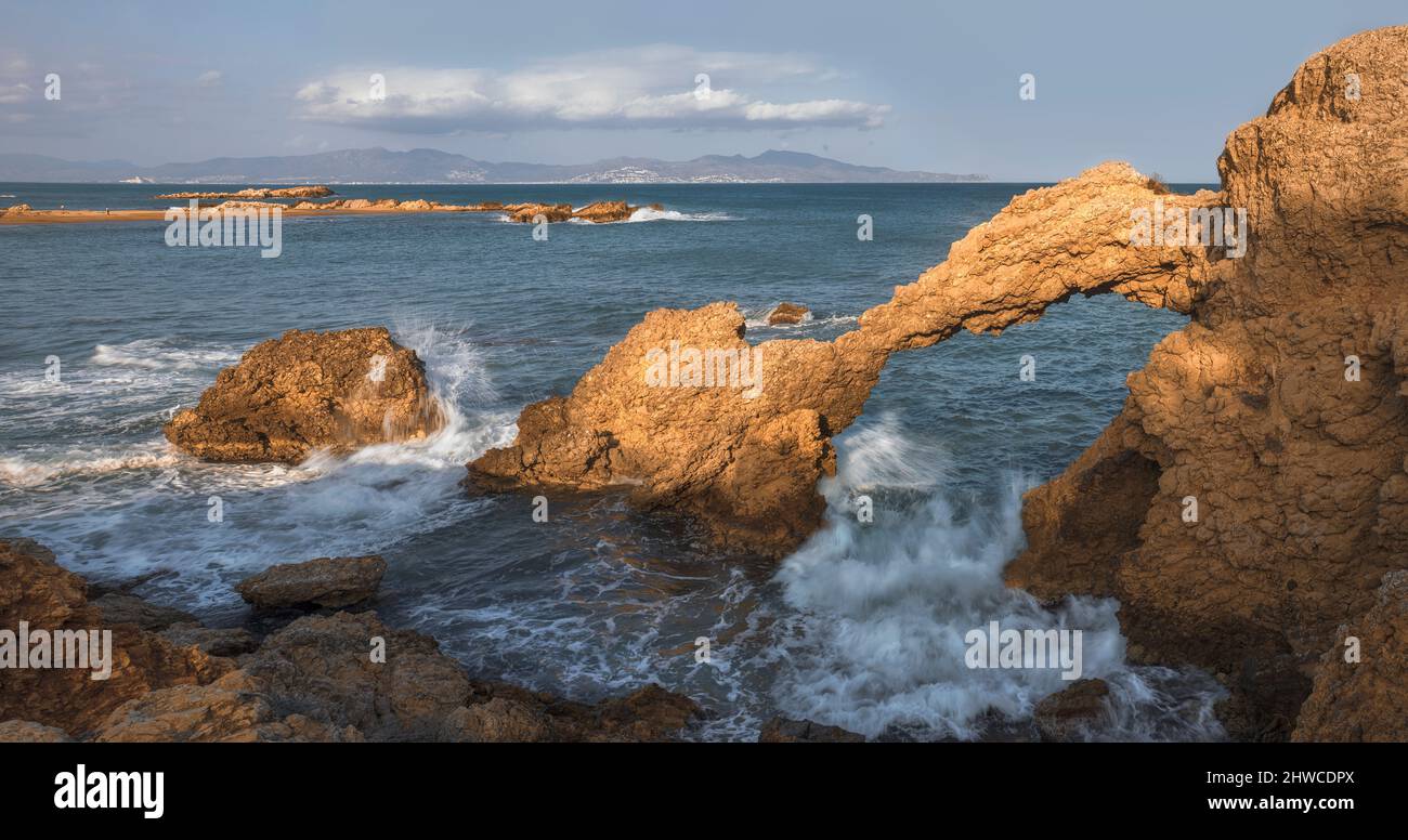 Natural Arch at the Beach in L'escala, Catalonia Stock Photo