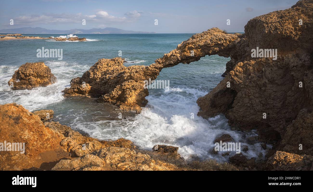 Natural Arch at the Beach in L'escala, Catalonia Stock Photo
