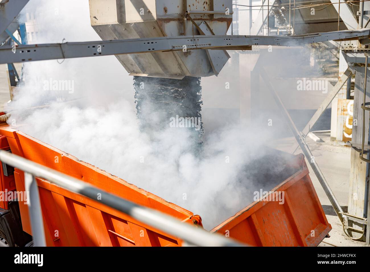 Photo of loading process of construction material at factory Stock ...
