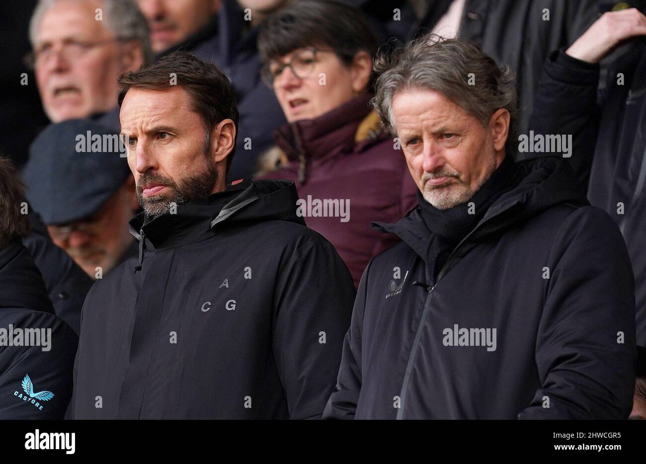 England manager Gareth Southgate (left) with Wolverhampton Wanderers technical director Scott Sellars in the stands before the Premier League match at Molineux Stadium, Wolverhampton. Picture date: Saturday March 5, 2022. Stock Photo