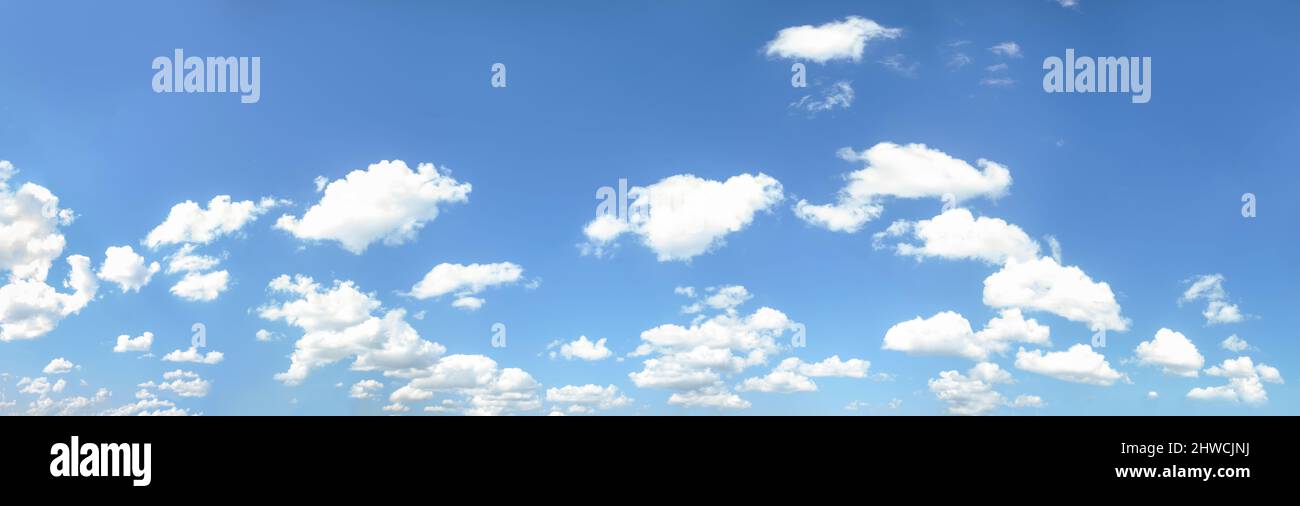 Blue sky background with tiny clouds, panorama Stock Photo - Alamy