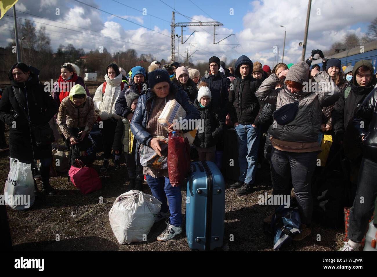 Olkusz, Poland. 28th Feb, 2022. Ukrainian refugees seen at Olkusz train station.Over 700,000 Ukrainian people seek refuge in Poland as result of RussiaÃ-s aggression on their country. Many of them come to Polish cities by train, where humanitarian help is organized for those in need. (Credit Image: © Vito Corleone/SOPA Images via ZUMA Press Wire) Stock Photo