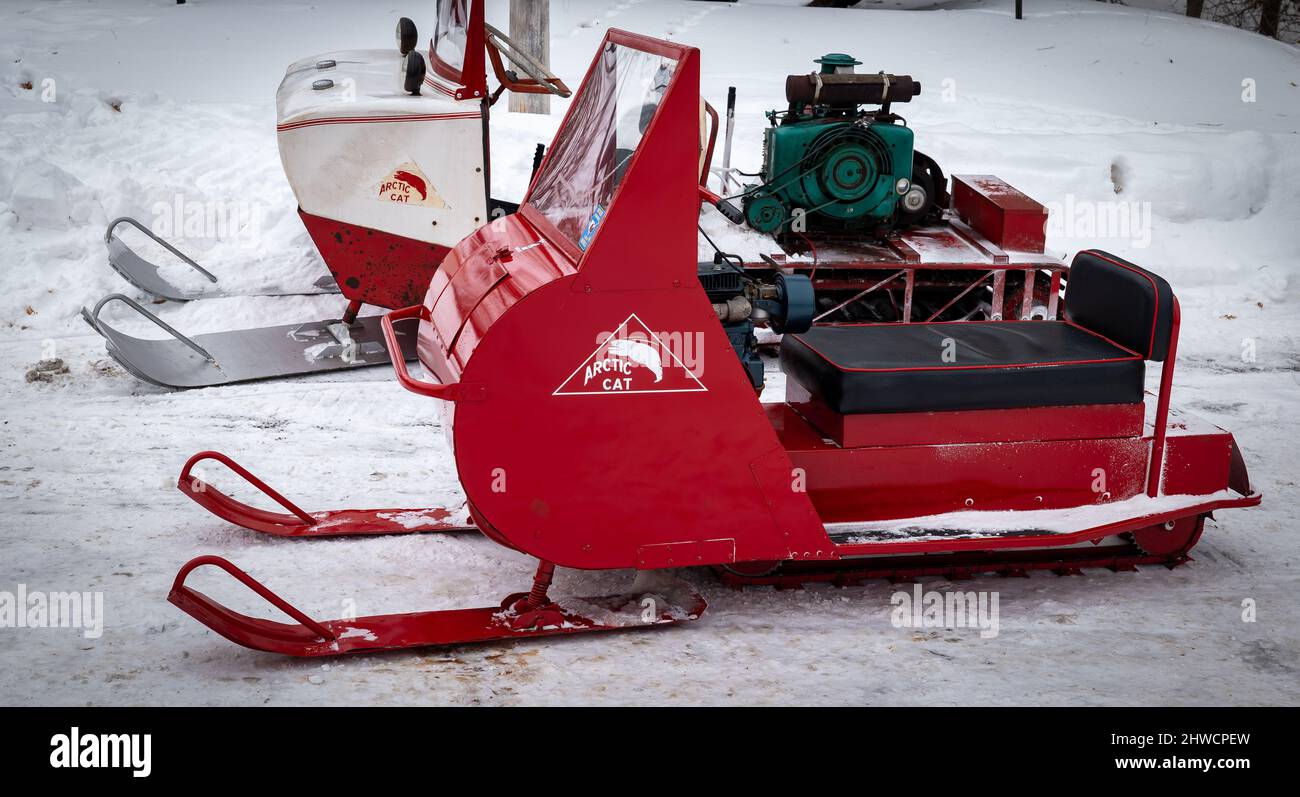 NISSWA, MN - 5 JAN 2022: Two antique Arctic Cat snowmobiles NISSWA, MN - 5 JAN 2022: Two antique Arctic Cat snowmobiles