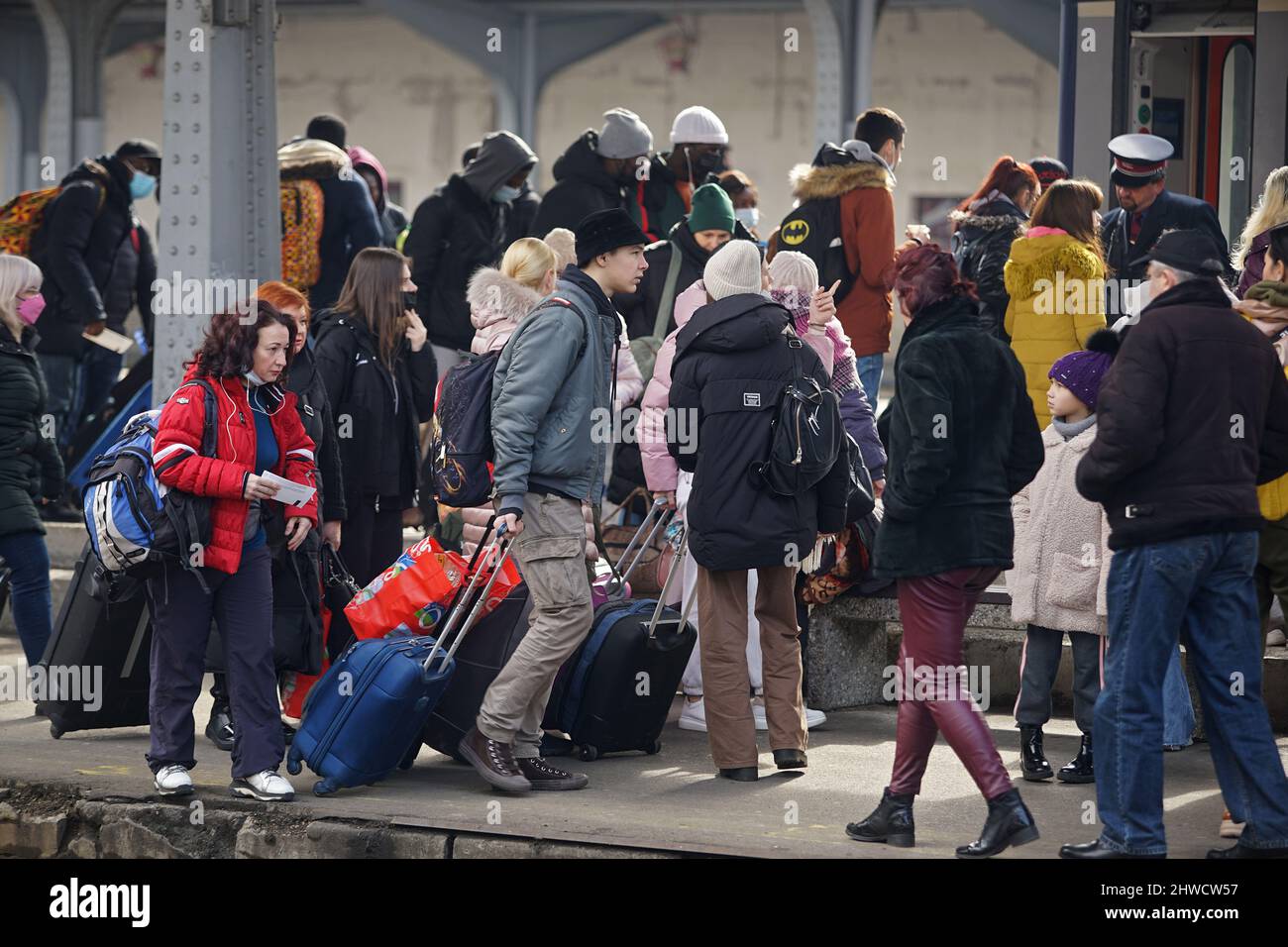 Bucharest, Romania - March 03, 2022:  Ukrainian refugees from Ukraine board the train to Vienna at the North Railway Station, to escape Vladimir Putin Stock Photo