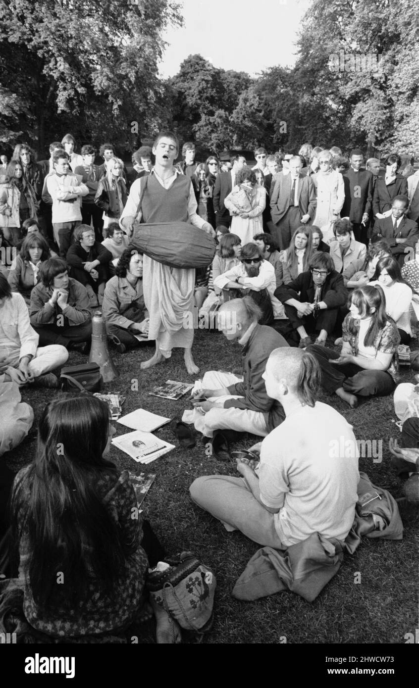Group of teenagers gathered at Hyde Park following the conclusion of the all day pop concert, which was headlined by Eric Clapton's band Blind Faith.7th June 1969. Stock Photo