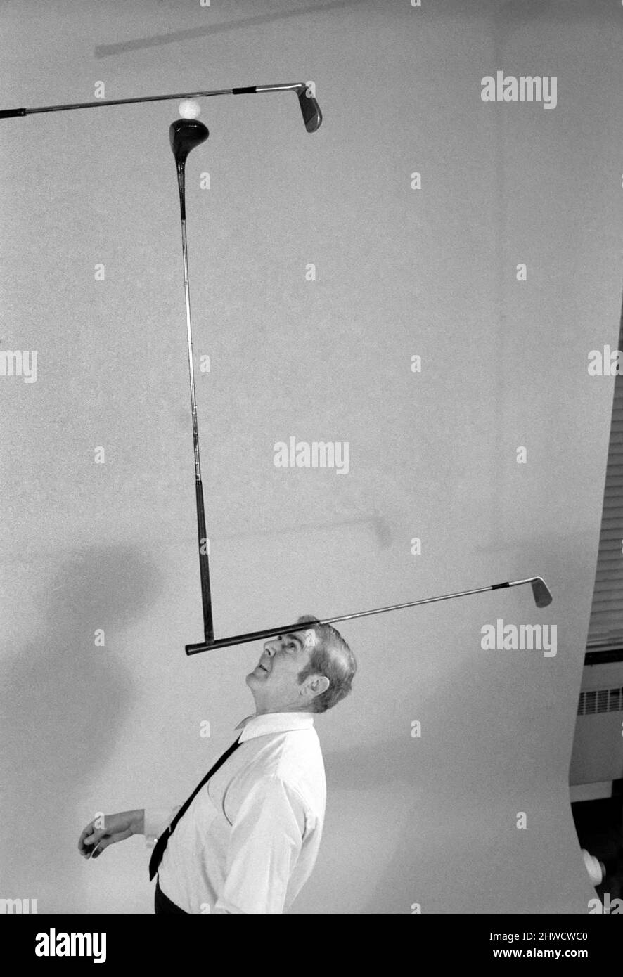 Entertainment Juggling Juggler Rob Murray doing his thing with three golf clubs and a golf