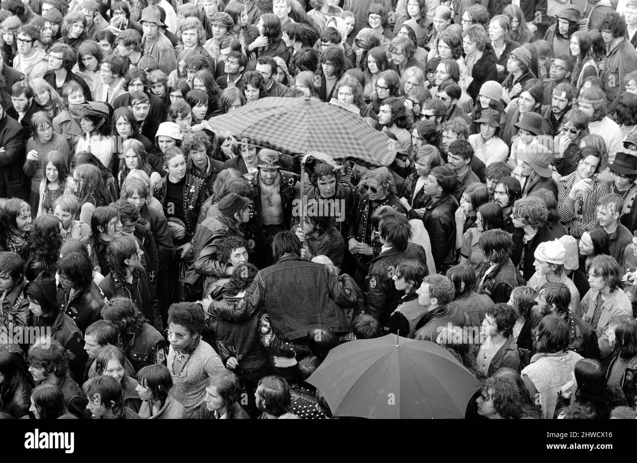Rockers mingle in the crowd at Free Hyde Park Pop Festival featuring Canned Heat, Eric Burdon & War and John Sebastion. 12th September 1970. Stock Photo