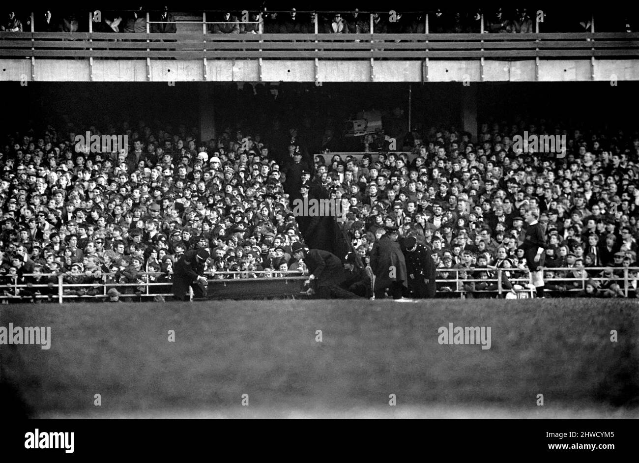 Derby v. Nottingham Forest. Police and St. John mt. men at the trouble spot in the crowed. December 1969 Z11534-013 Stock Photo