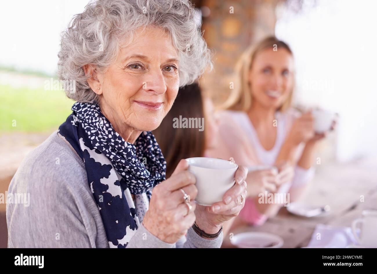 Tea revives you. Shot of three generations of the woman of the women of a family having tea outside. Stock Photo