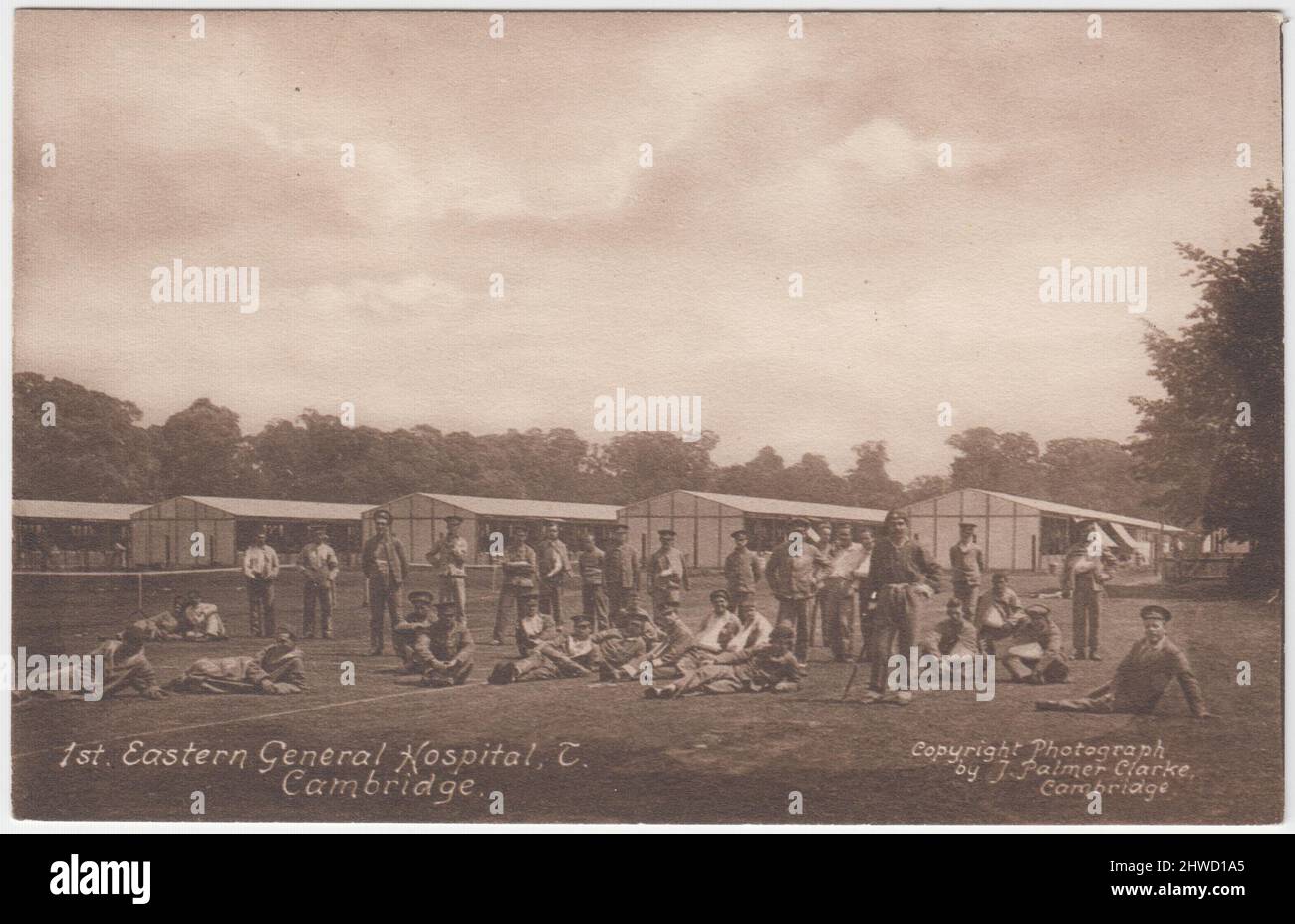 1st Eastern General Hospital, Cambridge, First World War. Wounded soldiers outside the barrack blocks. Postcard published by J. Palmer Clarke, Cambridge Stock Photo