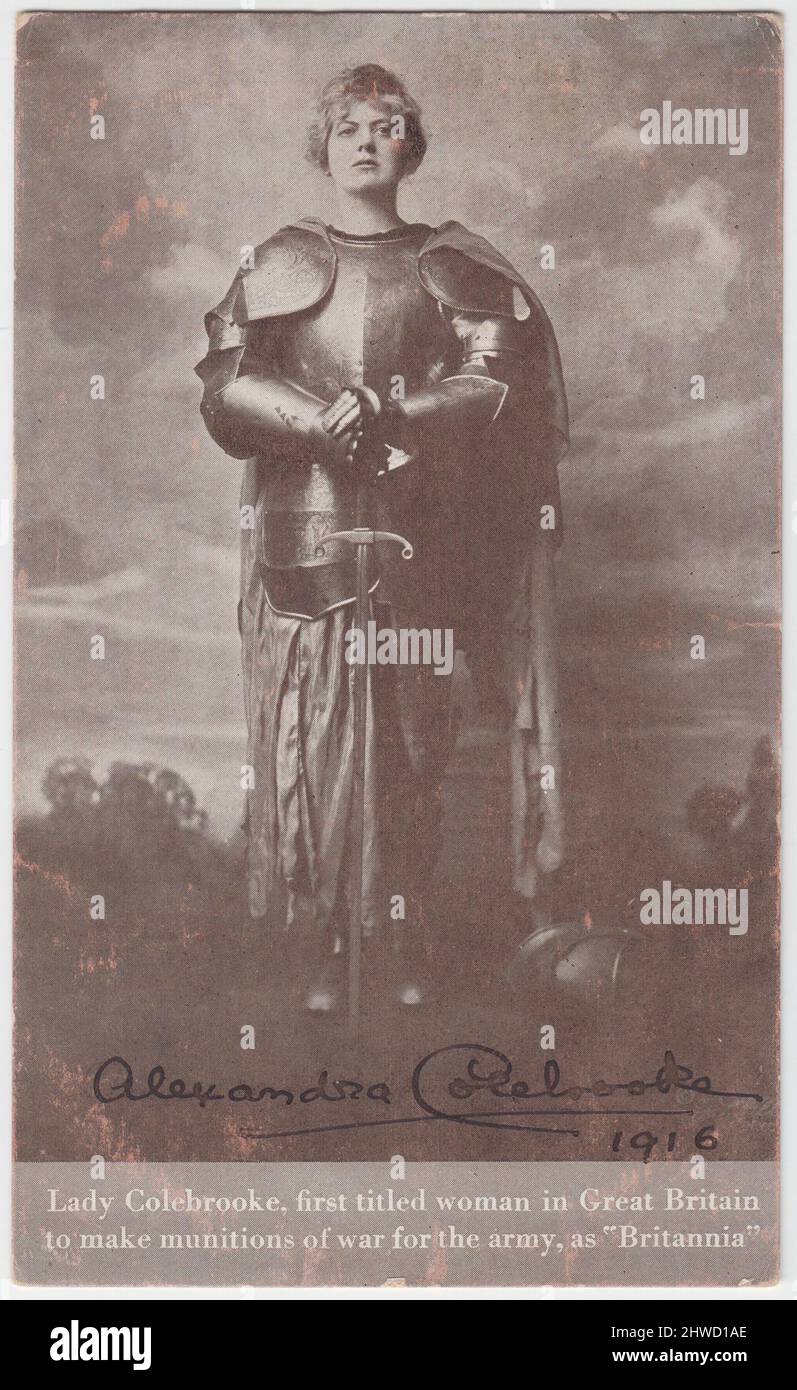 'Lady Colebrooke, first titled woman in Great Britain to make munitions of war for the army, as 'Britannia'', 1916: Alexandra, Lady Colebrooke, photographed in a suit of armour, holding a sword Stock Photo