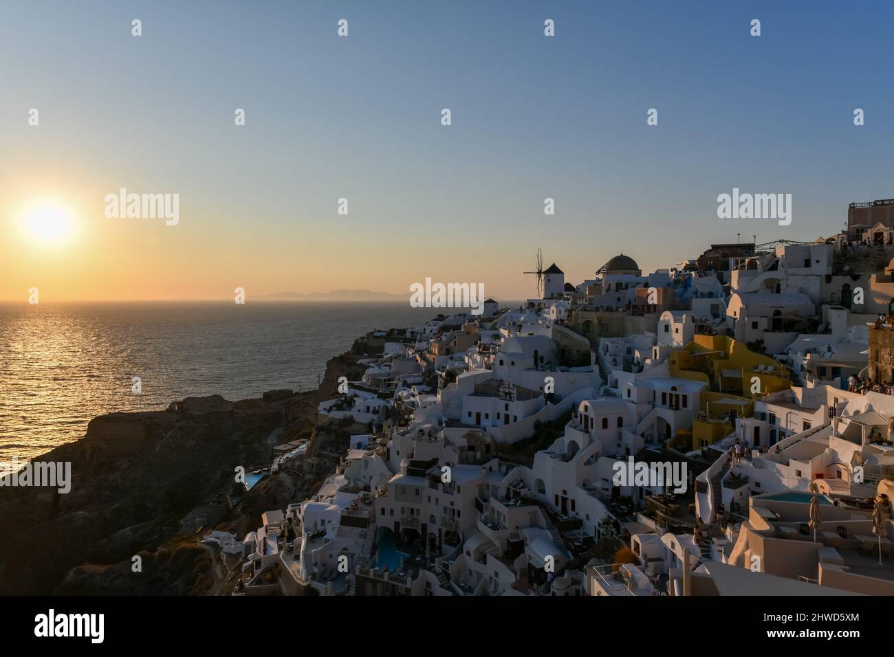 Classic Oia, Santorini skyline at sunset with buildings in Greece Stock