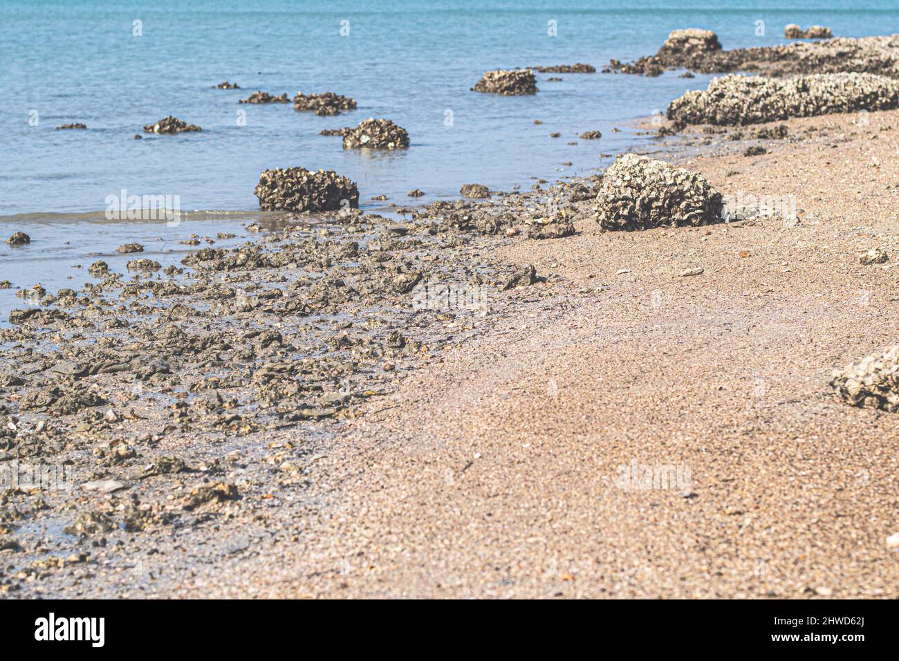 Beach rock horizon scenics Calm sea blue water ocean blue sky Stock ...