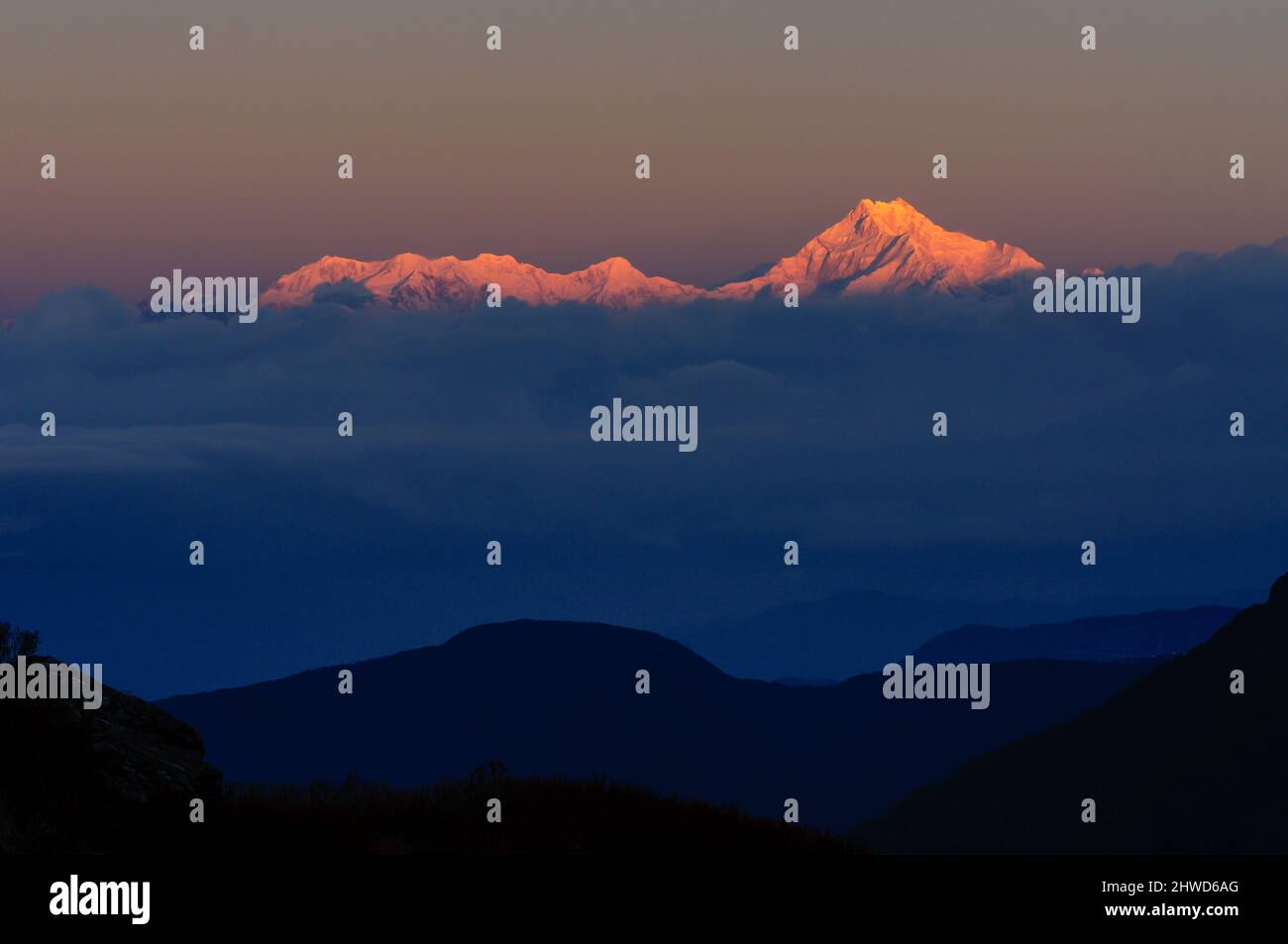 Magnificent view of Gold coloured Kanchenjunga mountain range in dawn, Himalayan mountain range, Sikkim, India Stock Photo