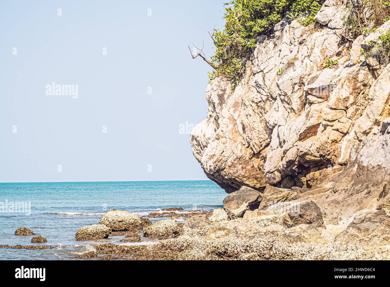 Beach rock horizon scenics Calm sea blue water ocean blue sky Stock ...