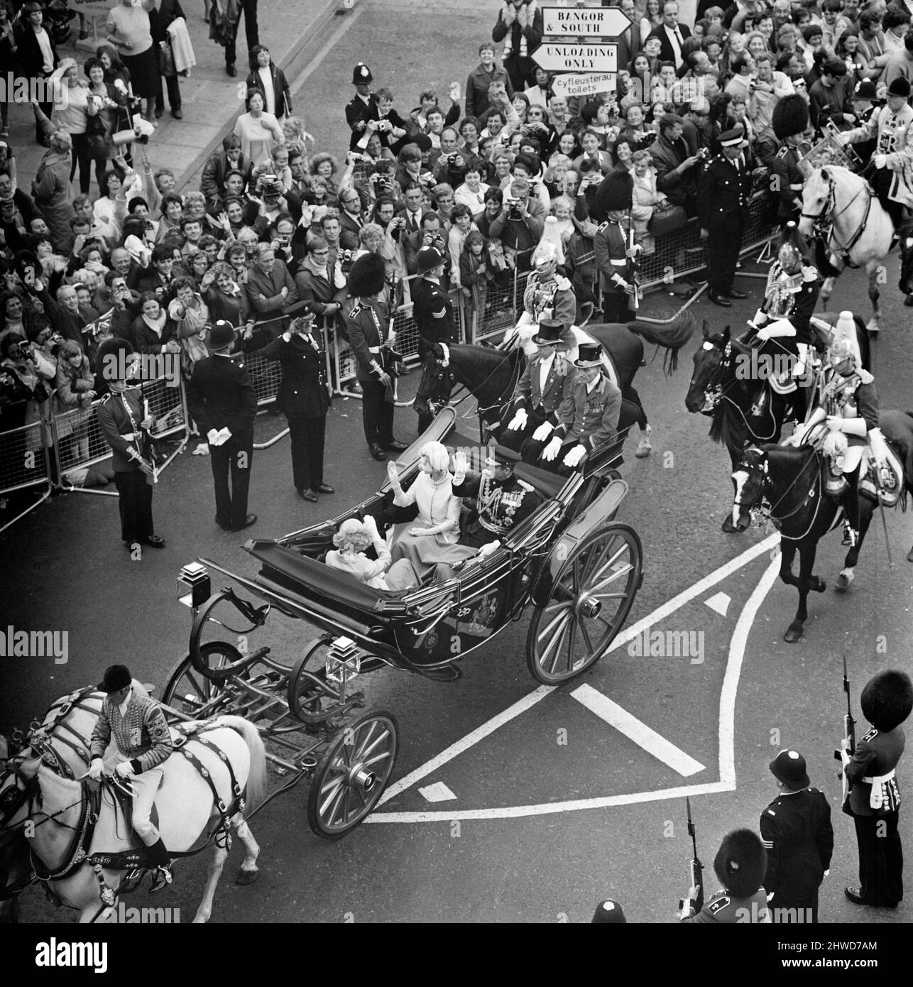 The Investiture of Prince Charles at Caernarfon Castle. Members of the royal family waving to
