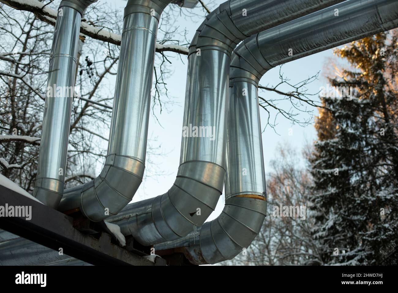 Heating pipes on street. Stainless steel. Urban communications Stock Photo Alamy