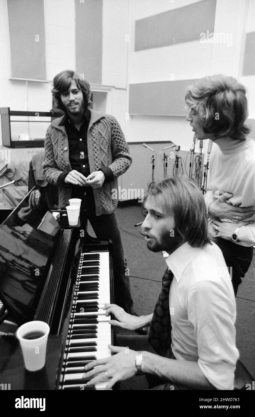 The Gibb Brothers a.k.a. The Bee Gees, newly reunited & back in the recording studio together, Soho London 3rd September 1970.  Hard at work on their first united venture in nearly two years.  Barry Gibb (24), who married former beauty queen Linda Gray 2 days earlier (1st sept.), broke his honeymoon to join his twin brothers Robin & Maurice Gibb in the studio. Stock Photo