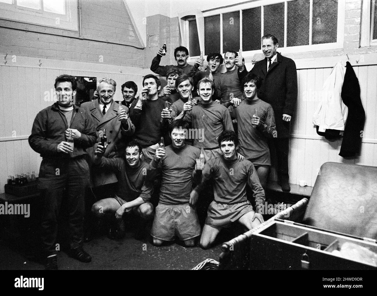 Sheffield Wednesday v Scunthorpe United FA Cup fourth round match at Hillsborough January 1970.   Celebrations in Scunthorpe dressing room with winning goal scorer at back (arm raised in salute)     Final score:  Sheffield Wednesday 1-2 Scunthorpe United Stock Photo