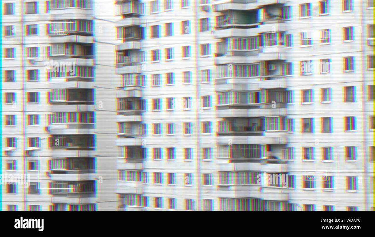 Video recording of high residential buildings in sleeping area against the grey cloudy sky. Video shooting Stock Photo