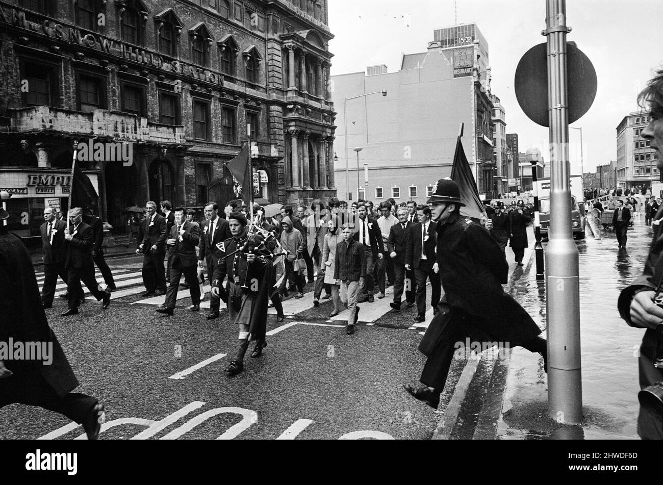 Irish march in Birmingham city centre, West Midlands. Taking part in the march are Robert Daly, aged 13, his sister Rita, aged 10, and Bernadette Barnett, aged 11, (not all visible in photo), three cousins of Gerald McAuley who was shot dead in Belfast a week earlier. An estimated 3000 men, women and children took part in this Northern Ireland civil rights march. 20th August 1969. Stock Photo