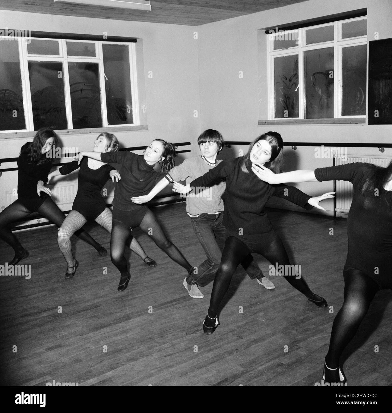 Actor Jack Wild who played the role of the Artful Dodger in the 1968 Lionel Bart musical film Oliver! Pictured practising dance moves with other young girls at the Barbara Speake Stage School. 28th February 1969. Stock Photo