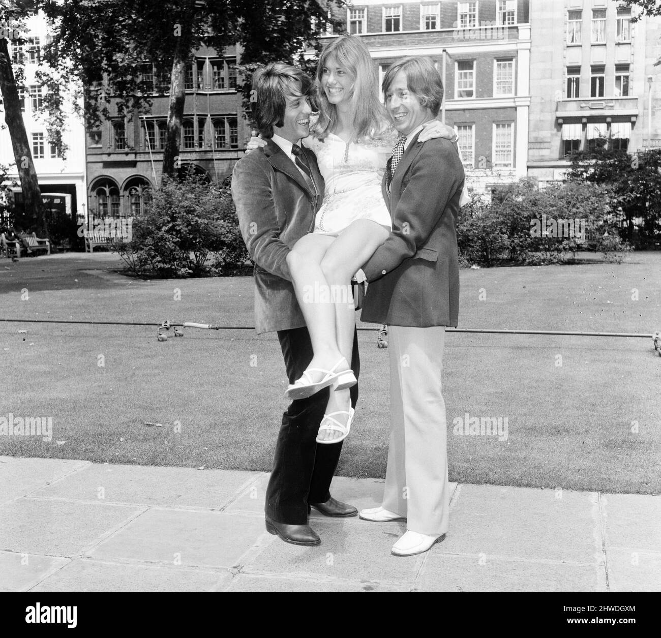 Toomorrow, pop group photo-call in Soho Square, London, ahead of the release (10th July) of their first single, titled, You're My Baby Now, pictured Wednesday 8th July 1970.  Our picture shows, lead singer Olivia Newton-John with guitarist Ben Thomas wearing dark trousers, and Vic Cooper, pianist. Stock Photo
