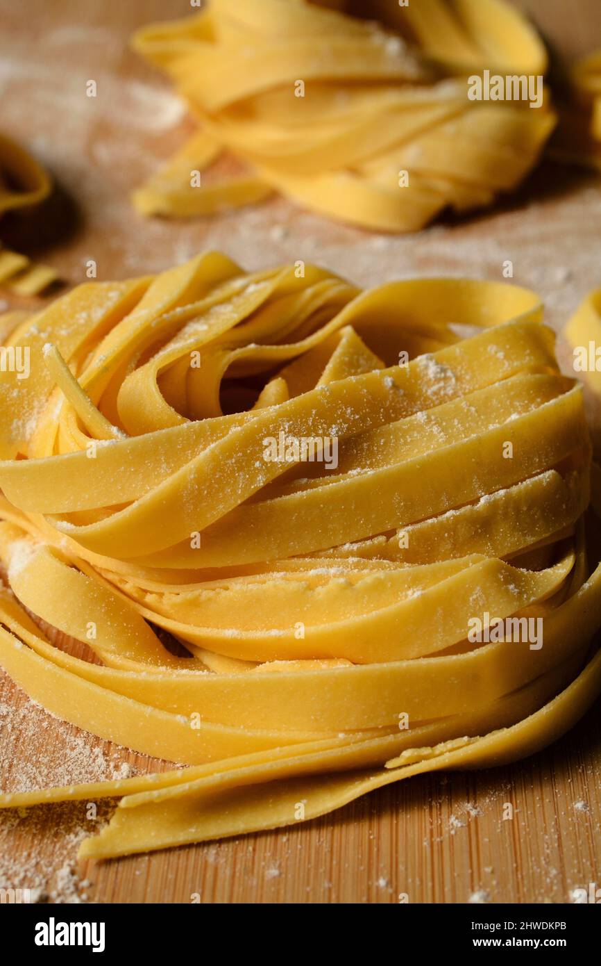 Tagliatelle. Freshly made pasta rolled into a nest Stock Photo Alamy
