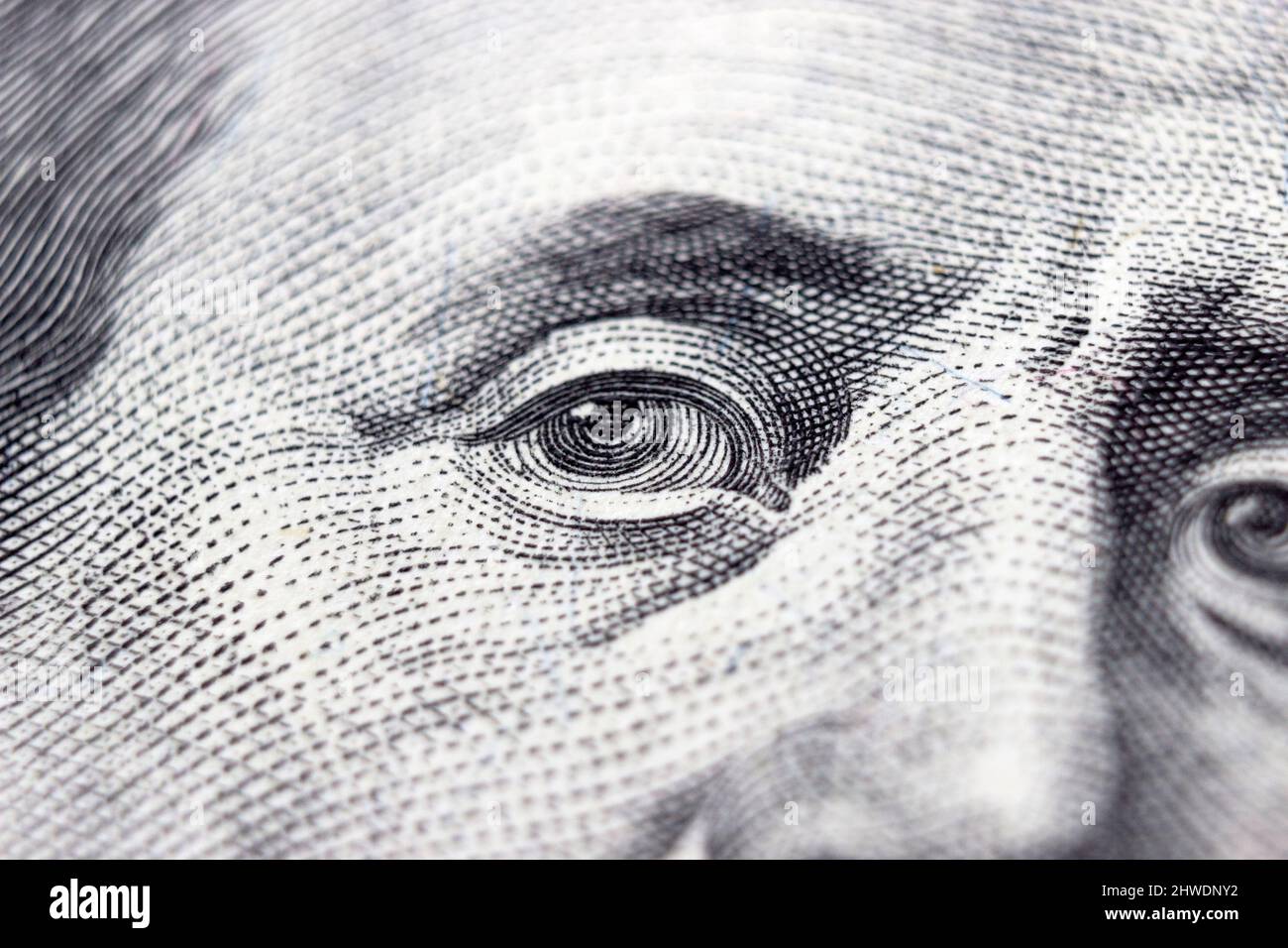 One hundred dollars bill fragment with the portrait Benjamin Franklin's eyes. 100 Stock Photo