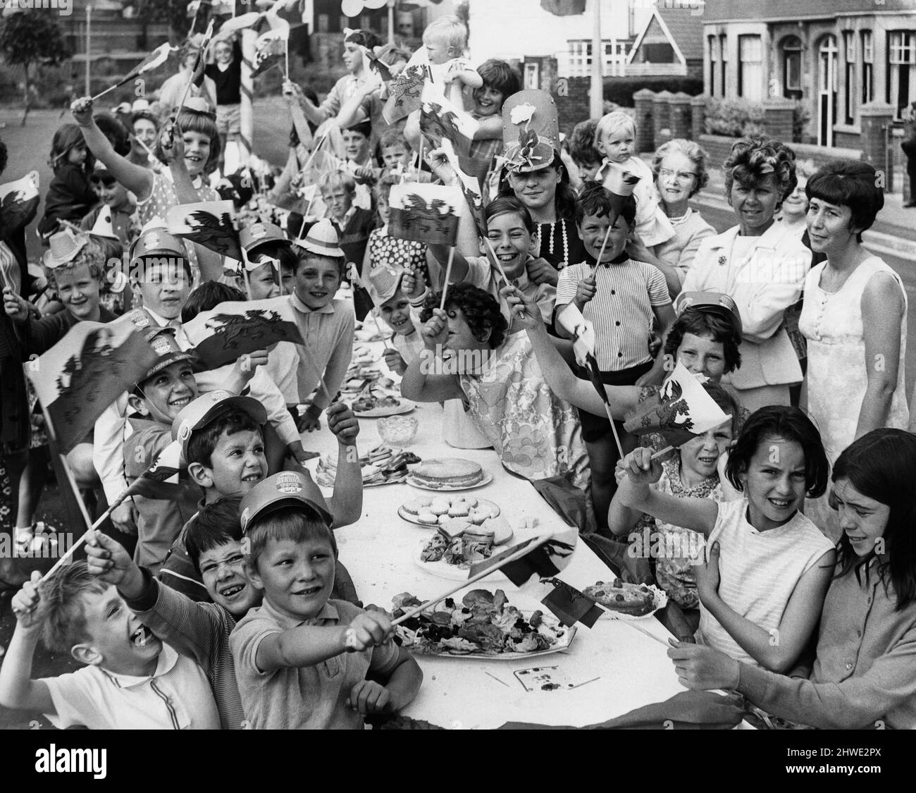 A street party for the Investiture of Prince Charles. Abercynon Street, Grangetown, Cardiff, Wales. 1st July 1969. Stock Photo