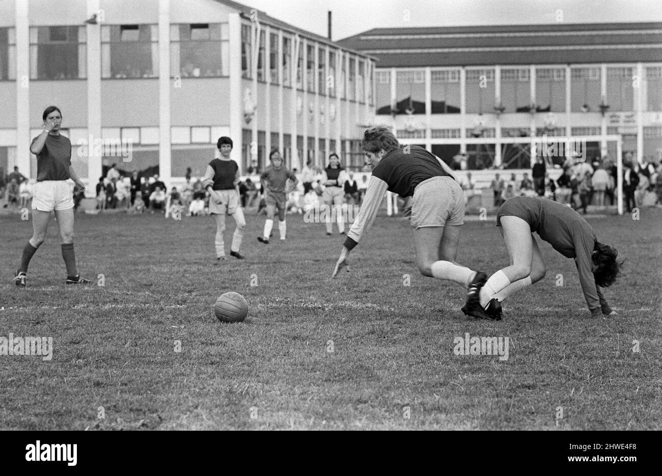 Ladies football match. Southampton Ladies v Beecham Belles from Berkshire. Final score 13 - 0 to Southampton Ladies. Semi-final of the Women's International Football Competition. Clacton, Essex. Bottoms up for ten goal girl Sue Lopez and Belle Pauline Barnett (right). 6th September 1969. Stock Photo