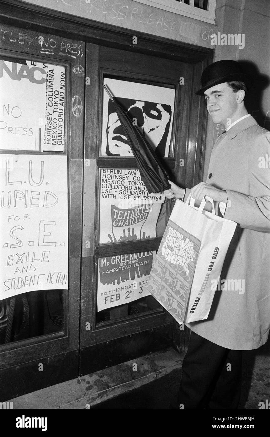 Students occupying the Union of London University headquarters in Malet Street, hold a meeting to formulate the future plans of action. The protesters said they wanted to set up a revolutionary base and establish a London School of Economics in exile, the LSE has been closed following protests by students angry at the installation of steel security gates. Pictured, Rodney Gilbert (20) who is studying law at Kings College, arrives at the headquarters to collect his mail. He is the Secretary and Vice Chairman of London University Conservative Association. 28th January 1969. Stock Photo