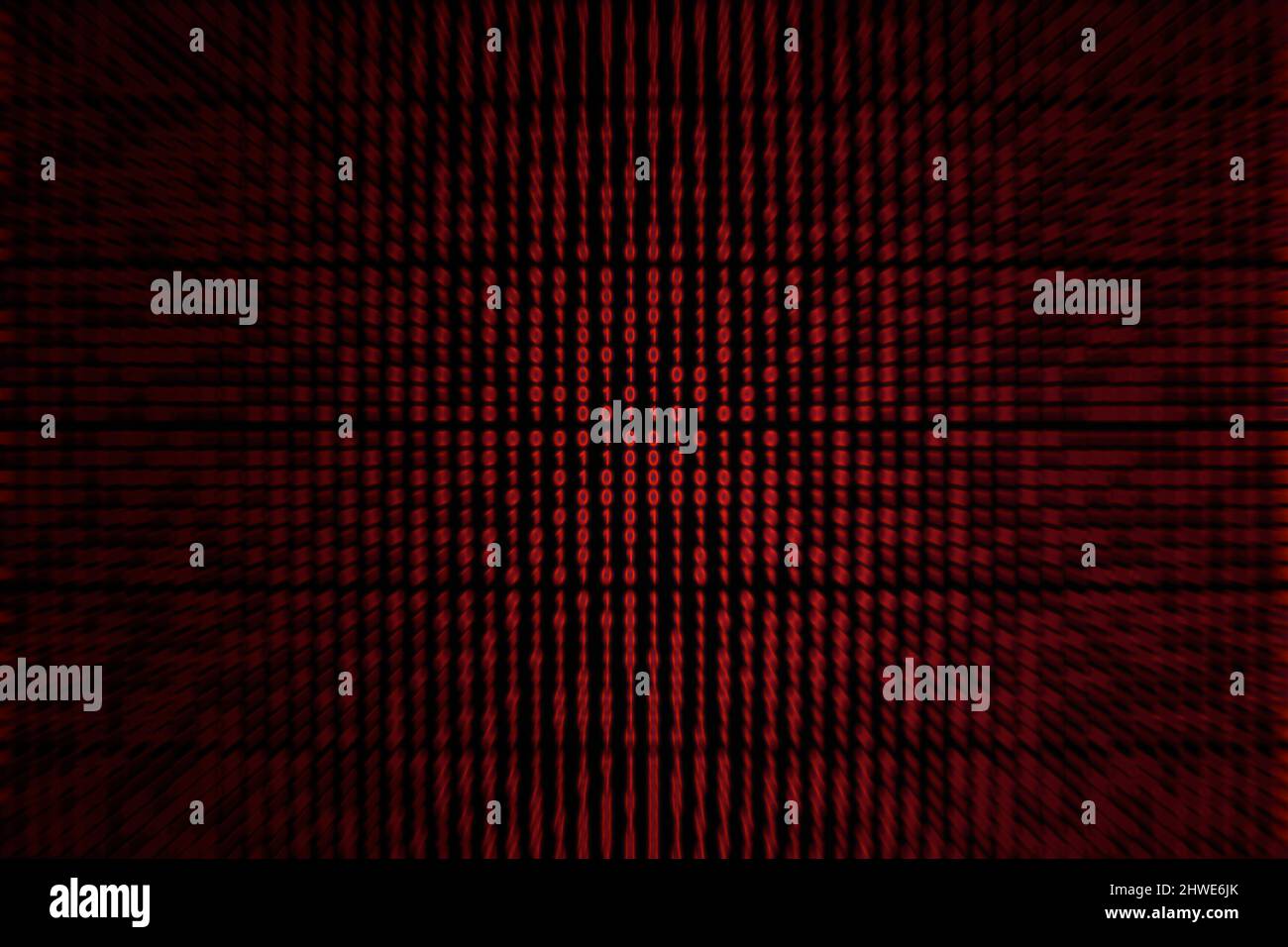 Zoom in on a red binary code background. Stock Photo