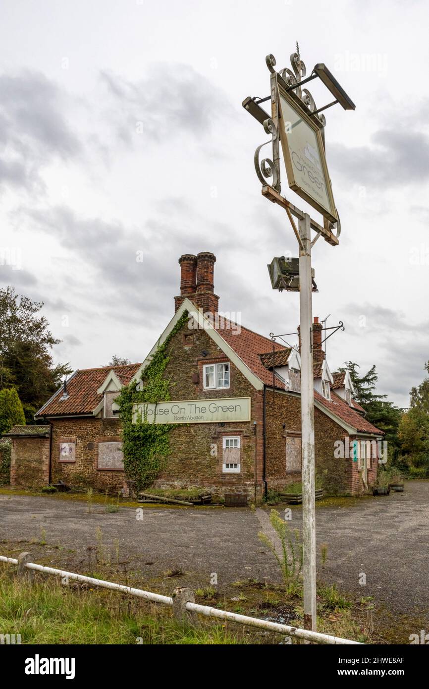 Boarded up closed country pub. The House on the Green in North Wootton, Norfolk. Stock Photo