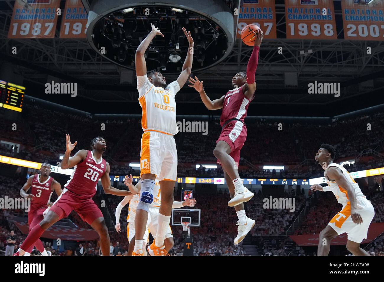 March 5, 2022: JD Notae #1 of the Arkansas Razorbacks tries to shoots the ball over Jonas Aidoo #0 of the Tennessee Volunteers during the NCAA basketball game between the University of Tennessee Volunteers and the University of Arkansas Razorbacks at Thompson Boling Arena in Knoxville TN Tim Gangloff/CSM Stock Photo