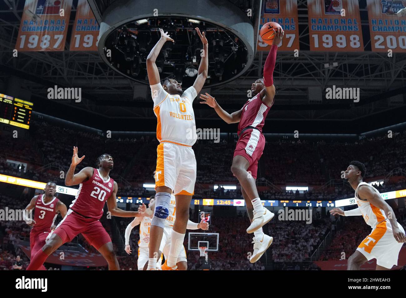 March 5, 2022: JD Notae #1 of the Arkansas Razorbacks tries to shoots the ball over Jonas Aidoo #0 of the Tennessee Volunteers during the NCAA basketball game between the University of Tennessee Volunteers and the University of Arkansas Razorbacks at Thompson Boling Arena in Knoxville TN Tim Gangloff/CSM Stock Photo