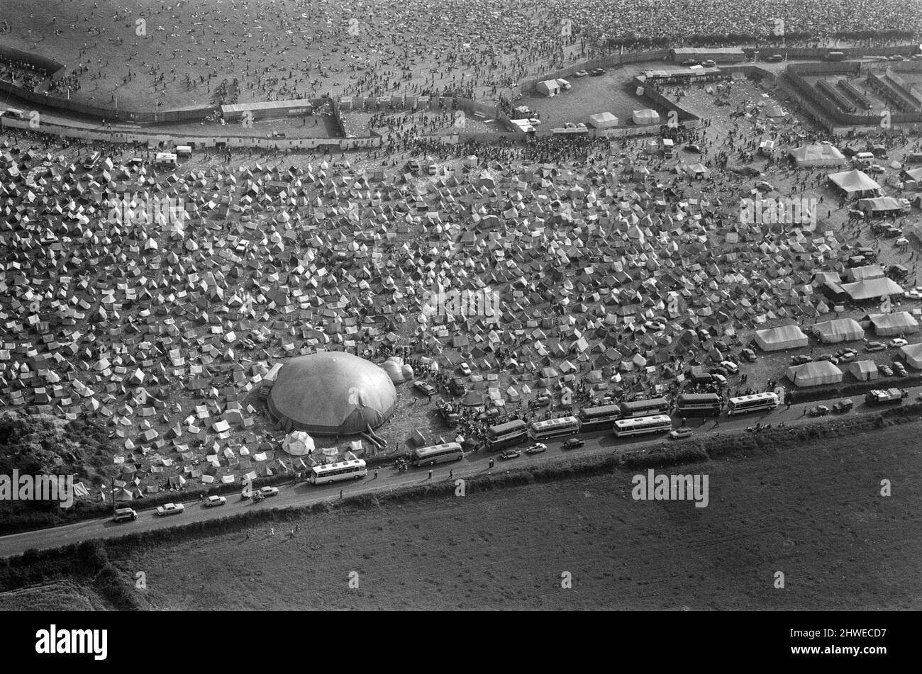 An aerial view of the 120,000 pop fans massed together at Freshwater on the Isle of Wight for the weekend pop festival. Pictures show the performance area and tented section. 28th August 1970. Stock Photo