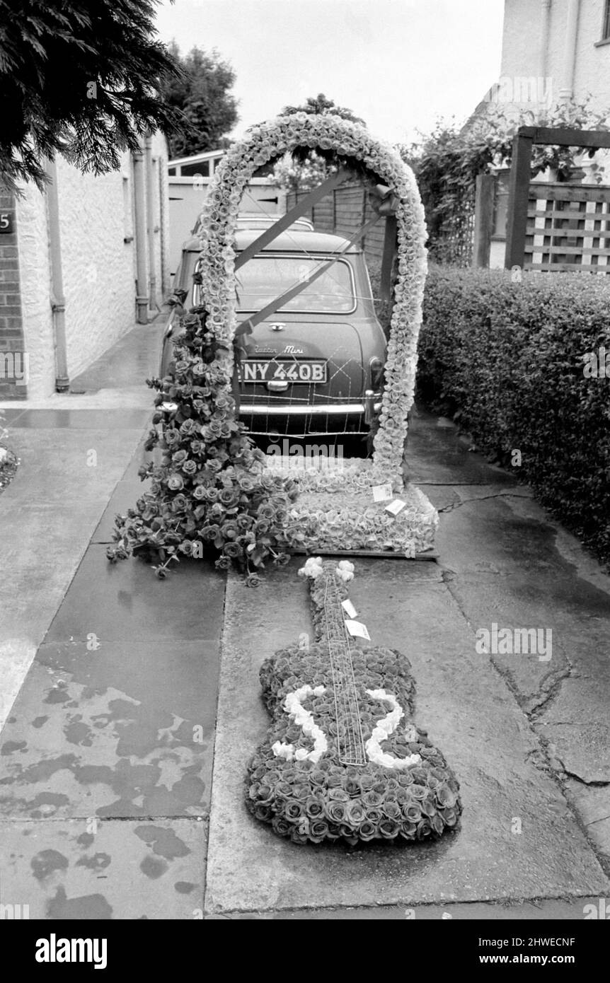 Rolling Stones: Brian Jones funeral. A floral tribute depicting  the gates of heaven from the Rolling Stones and a floral guitar from 'gofer' Tom Keylock 10 July 1969 Stock Photo